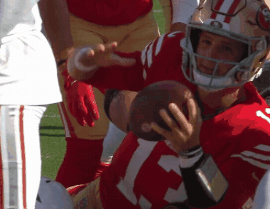 Brock Purdy Holding The Football GIF