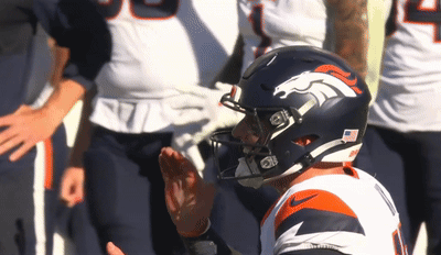 Broncos Football Player With Number 1 Helmet