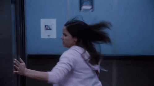 Brooklyn Nine Nine Amy Santiago Closing Elevator GIF
