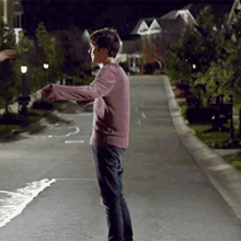 Brown Jacket Man Looking At Camera With Woman GIF