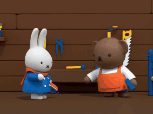 Brown Teddy Bear Holding Saw and Hammer