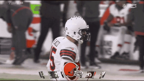 Browns Advertisement With Players And Referee GIF