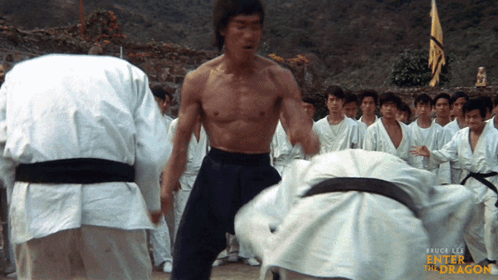Bruce Lee Drop Kick On People GIF