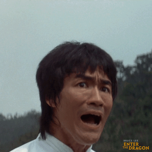 Bruce Lee Face Enter The Dragon GIF
