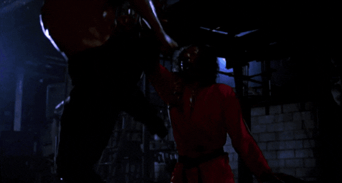 Bruce Leeroy Powerful Kick On Sho Nuff GIF