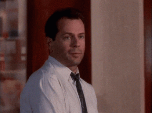 Bruce Willis Moving His Head GIF