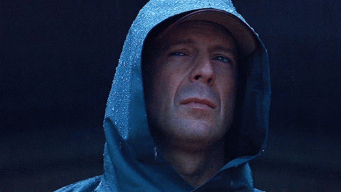 Bruce Willis Wearing Raincoat GIF