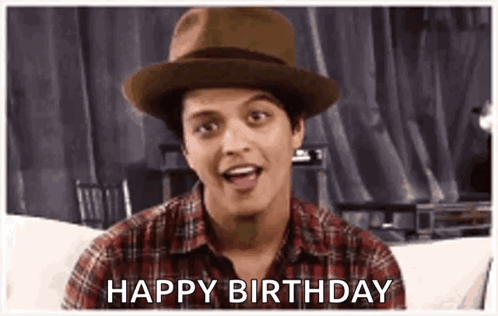 Bruno Mars in Hat and Plaid Shirt Saying Happy Birthday