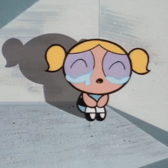Bubbles From The Powerpuff Girls Is Crying In A Corner With Her Eyes Closed GIF