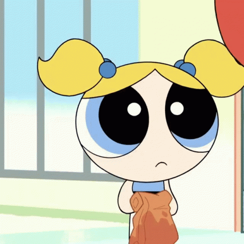 Bubbles From The Powerpuff Girls Is Holding A Brown Towel GIF