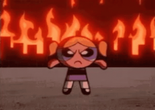 Bubbles Powerpuff Girl In Front Of Fire GIF