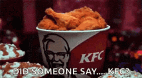 Bucket Of Fried Chicken Next To KFC Sign GIF