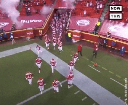 Bucs Team Running Towards Competition GIF