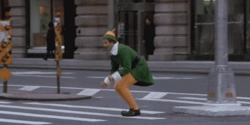 Buddy The Elf Street Hopping GIF