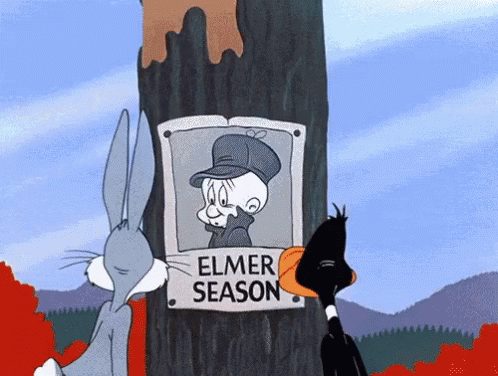 Bugs Bunny And Looney Tunes Are Looking At A Picture Of Elmer Season GIF