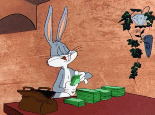 Bugs Bunny at Table with Money and Briefcase