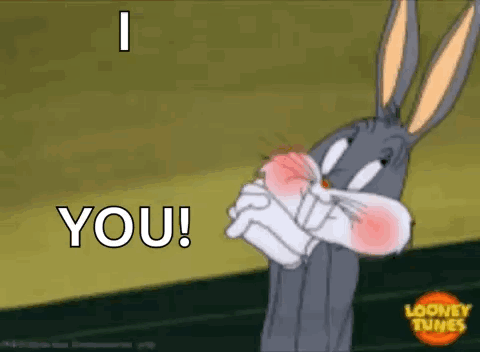 Bugs Bunny From Looney Tunes Is Making A Funny Face And Saying `` I You '' . GIF