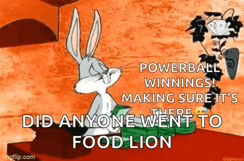 Bugs Bunny From Looney Tunes Is Sitting On A Table With A Bunch Of Money In His Hand . GIF