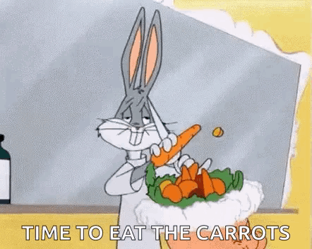 Bugs Bunny Is Holding A Carrot In His Mouth While Eating A Carrot Salad . GIF