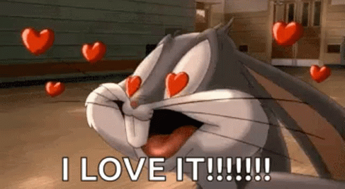 Bugs Bunny Is Holding Hearts In His Eyes And Saying `` I Love It ! '' GIF