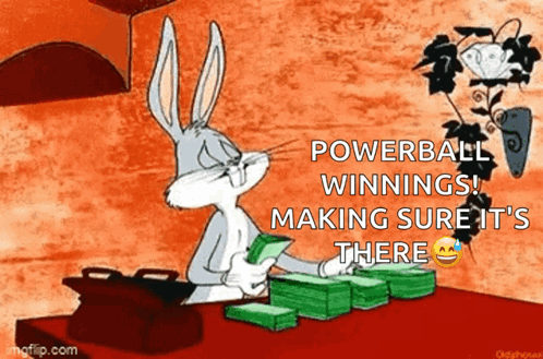 Bugs Bunny Is Sitting At A Table Holding A Stack Of Money And Making Sure It Is There . GIF