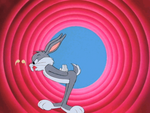 Bugs Bunny Is Standing In Front Of A Pink And Blue Circle With The Letter J On It GIF