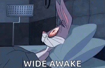 Bugs Bunny Lying In Bed Wide-Eyed GIF