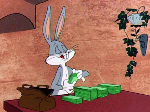 Bugs Bunny Sitting at Table with Stack of Money
