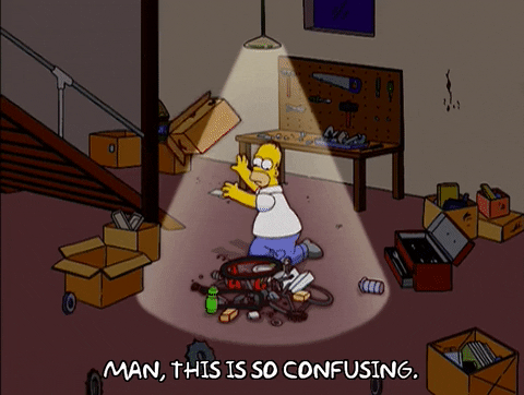 Build Bicycle Parts Confused Homer Simpson GIF
