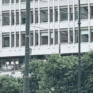 Building With Many Windows And Street Light GIF