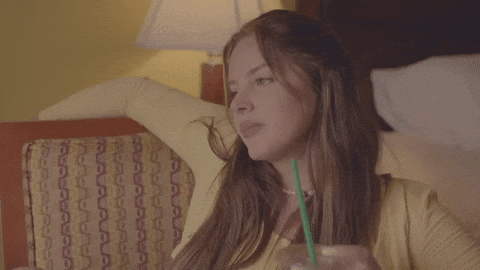 Bummed Lana Del Rey Sitting On Couch GIF