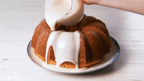 Bundt Cake With Icing Being Poured GIF