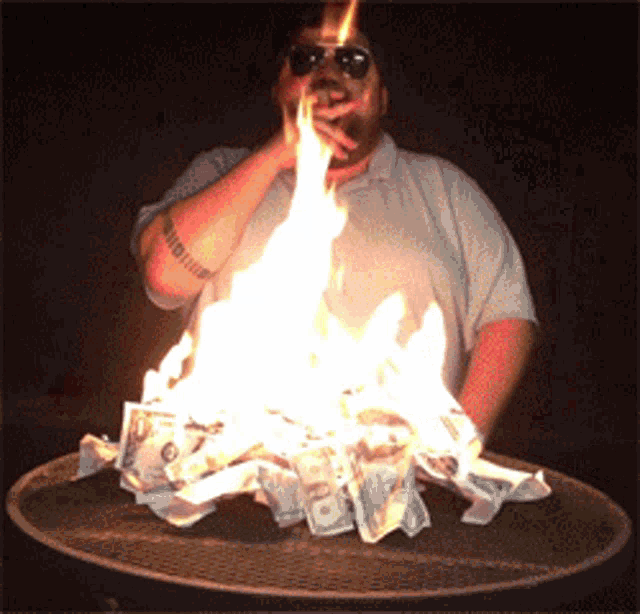 Burning Money Laughing Hahaha Evil GIF