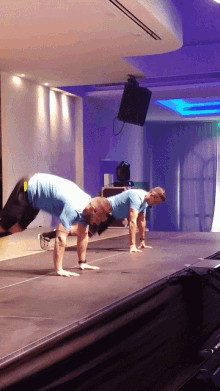 Burpee Exercise Instructors On Stage GIF