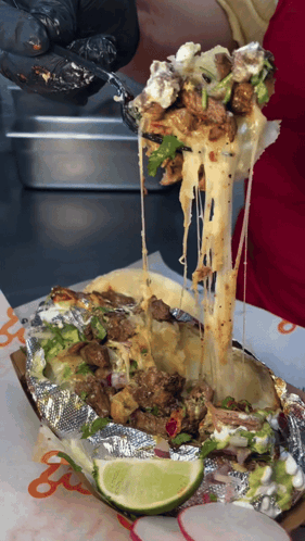 Burrito With Meat And Cheese Being Pulled Out GIF