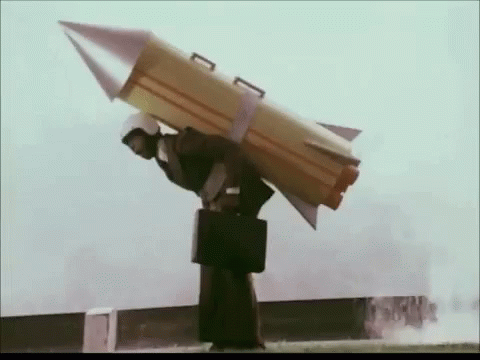 Businessman Strapped Rocket GIF