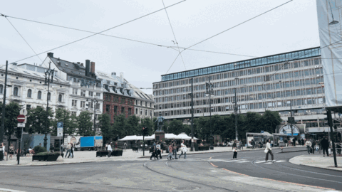 Busy Intersection With No Parking Sign GIF