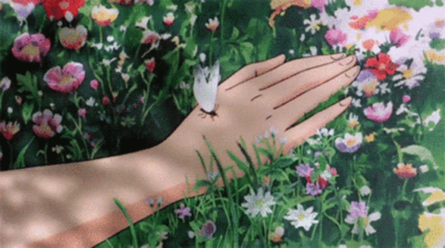 Butterfly On Hand Lying In Anime Flower GIF