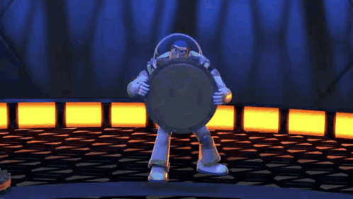 Buzz Lightyear From Toy Story Is Standing In A Dark Room Holding A Shield GIF