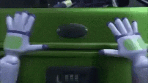 Buzz Lightyear Hands Reaching Toward Green Suitcase