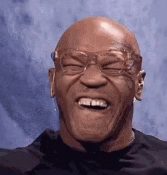 Cackling Mike Tyson Funny Face GIF