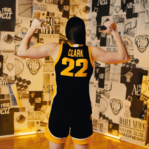 Caitlin Clark Showing Off Jersey Name GIF