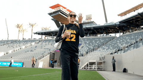 Caitlin Clark Wearing Dark Shades Football Arena GIF