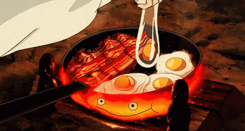 Calcifer Licking On Fried Eggs GIF