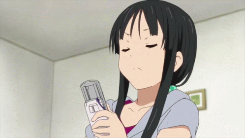 Calling Angry Anime Girl Mio Akiyama GIF