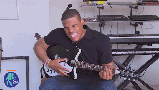 Cam Newton Playing Guitar GIF
