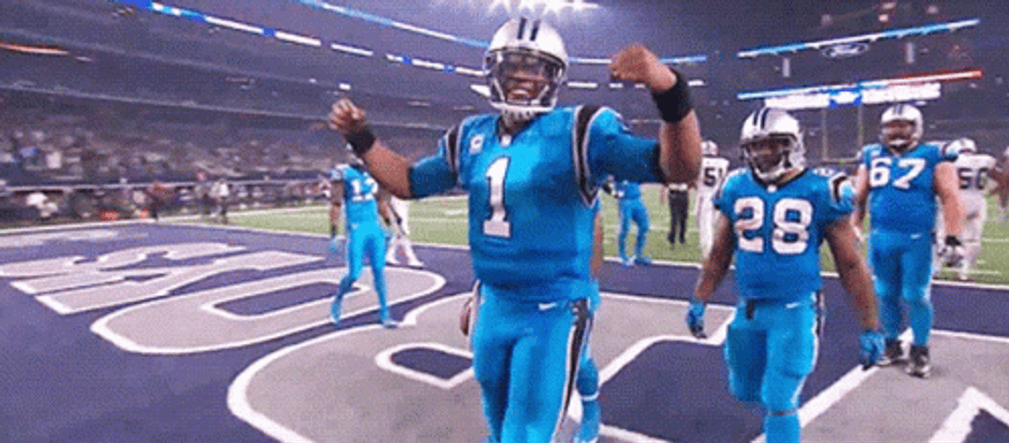 Cam Newton Quarterback Flexing Muscles GIF