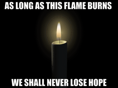 Candle Lit Up As Long As This Flame Burns We Shall Never Lose Hope