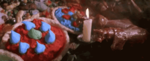 Candle Sitting Next to Pies