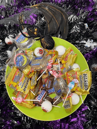 Candy Plate With Haribo Goldbears And Snickers GIF
